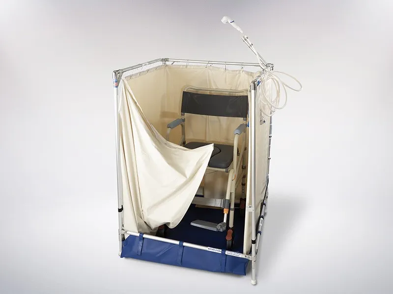 A compact FAWSsit Portable Shower with a shower chair inside.