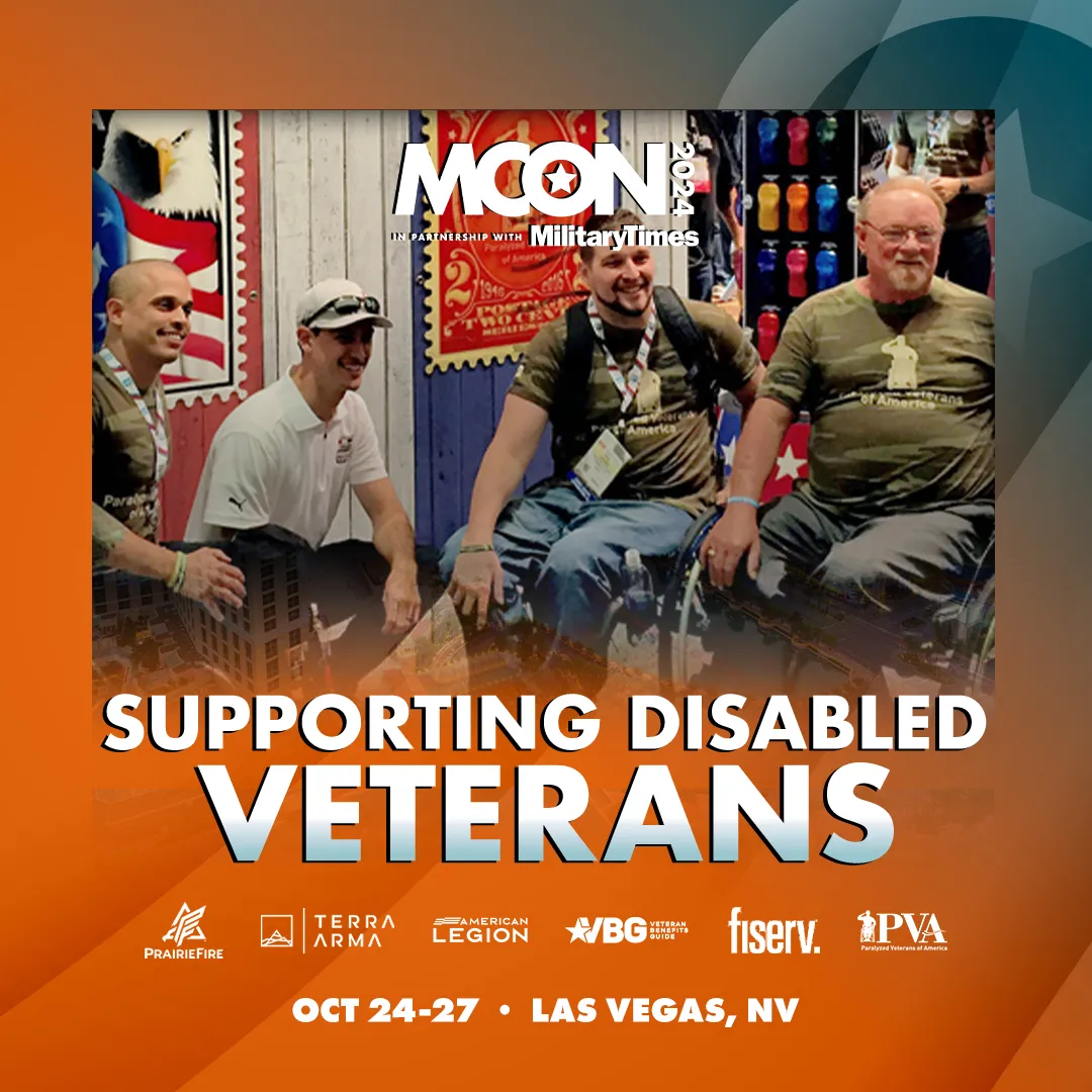 A group of wheelchair-using veterans are thoroughly enjoying their MCON experience along with the message: Supporting Disabled Veterans.