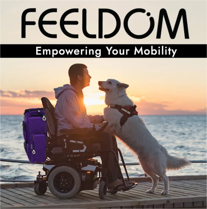 A man in a power chair with a purple Feeldom wheelchair bag is on a deck over the water with his service dog at sunset.