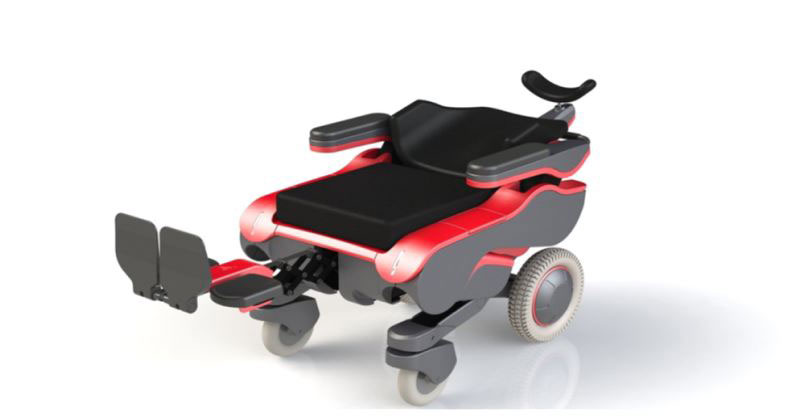 Red CheelCare Xceed Power Wheelchair on a plain white background. The backrest is reclined and the footrest is elevated to create a flat surface. The chair has been lowered to meet the height of the transfer surface.