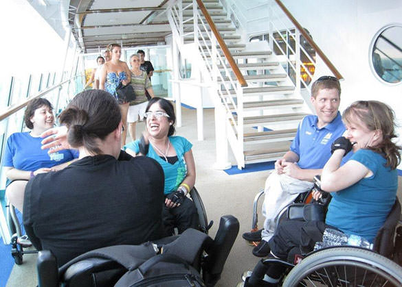 A group of wheelchair users enjoy vacation on a cruise.