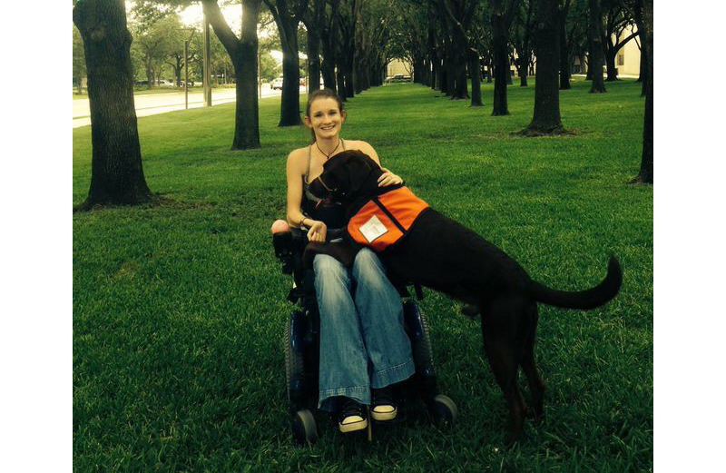 Katie and her assistance dog, Cowboy