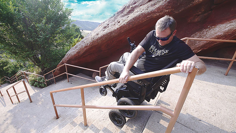 A man uses the iBOT to climb steep stairs in the Southwest