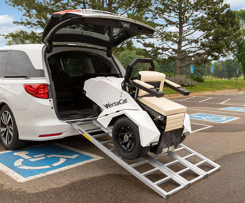 Using a ramp, the compact VertaCat can be rolled into the back of a van.