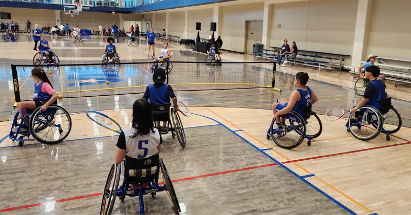 Photo of wheelchair tennis players