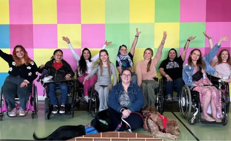 Photo of 10 Wheelie Babes and two service dogs